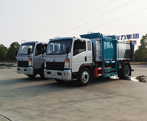 Deux unités de camion à ordures à compacteur à chargement latéral expédiées vers l'Ouganda