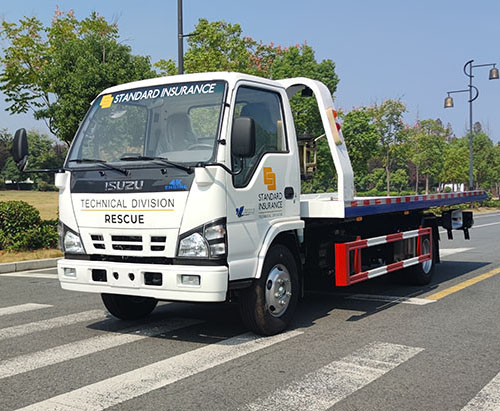 Une unité de camion de dépanneuse à plat ISUZU expédiée aux Philippines